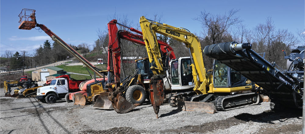 Various colours of heavy machinary