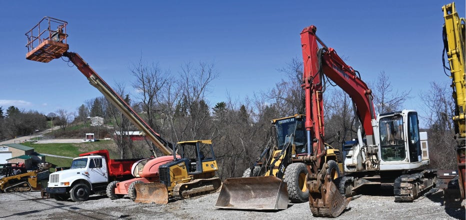 Various colours of heavy machinary
