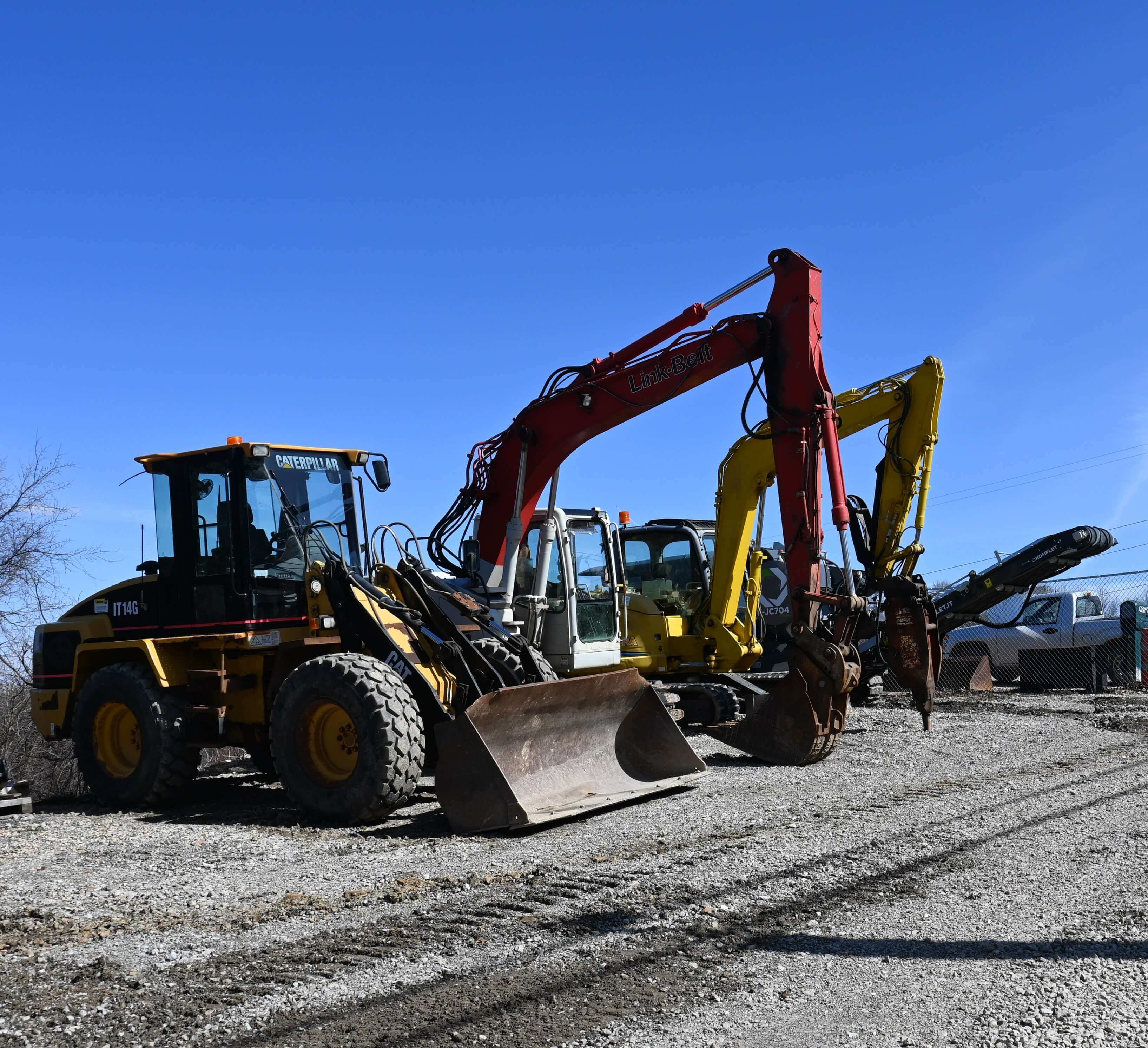 Various colours of heavy machinary